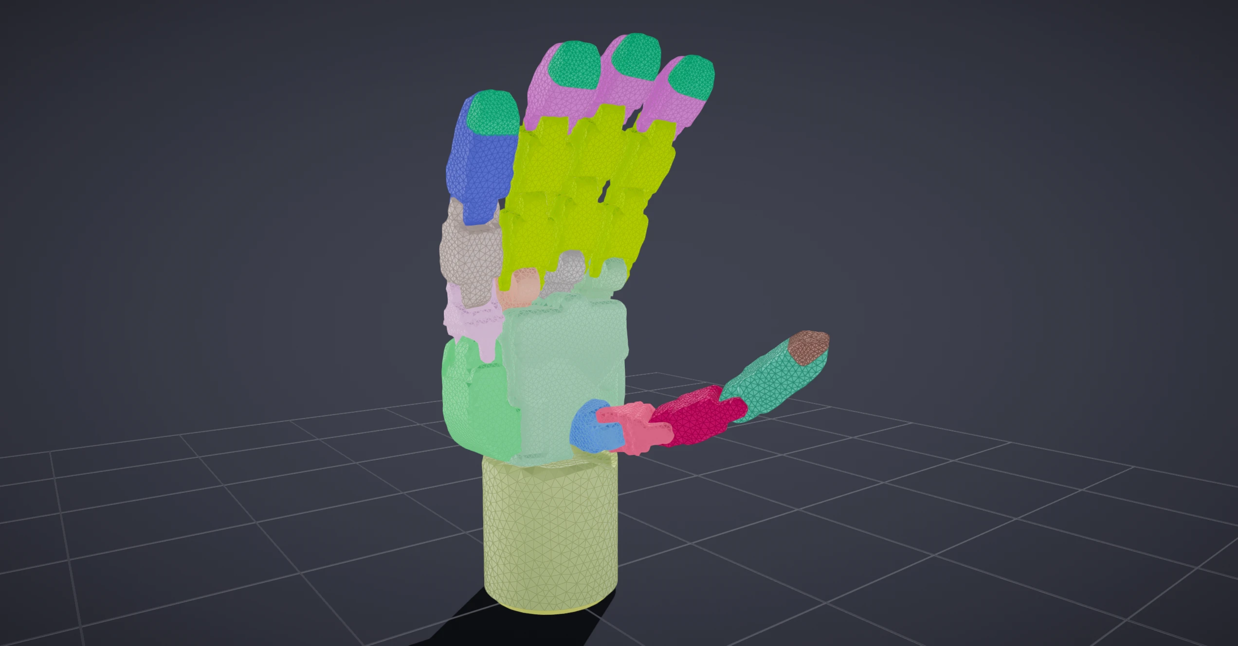 A robot hand shown as collision meshes only, each link drawn in a distinct color with its triangulation visible.